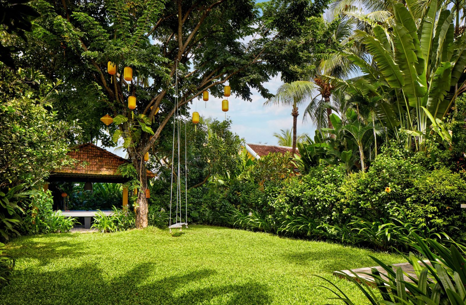 Tranquil tropical garden with lanterns